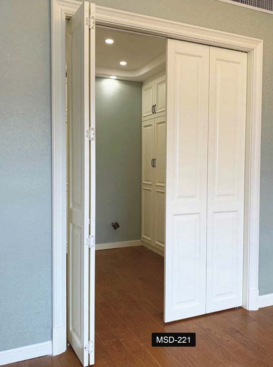 White bifold double door open to a walk-in closet