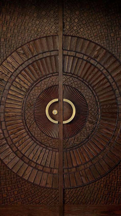 Hand-carved circular medallion door