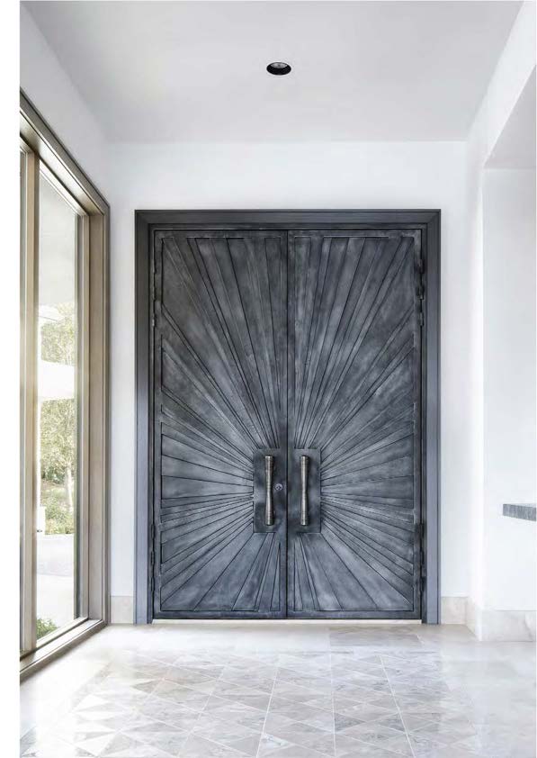 Forged metal sunburst double door